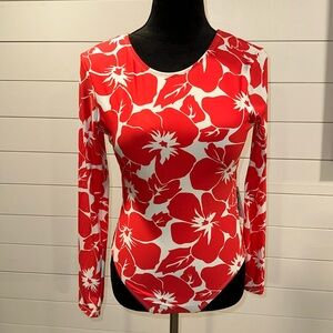 NWT- Vince Camuto long sleeve one piece swim suit. Size 10
